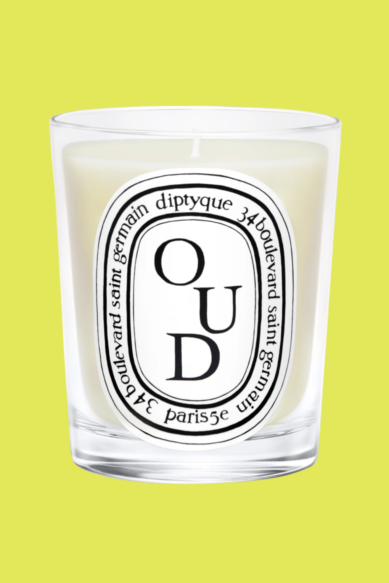 A glass oud-scented candle