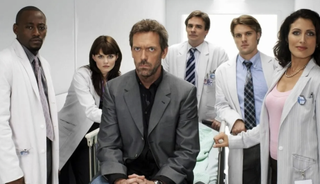 Hugh Laurie and the cast of House