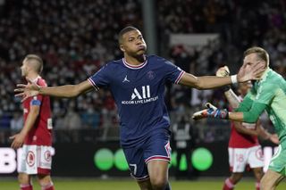 Kylian Mbappe celebrates after scoring for Paris St Germain