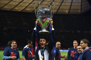 Luis Enrique celebrates with the Champions League trophy after Barcelona's win over Juventus in the 2015 final.