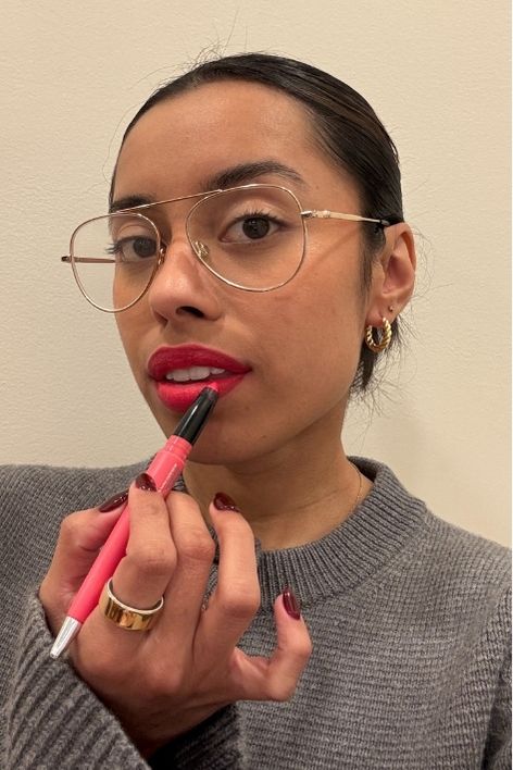 Ruby Ford-Dunker testing the Haus Labs Le Monster Lip Crayon.