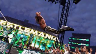 Promotional screenshot of Seth Rollins jumping off a barricade in WWE 2K25