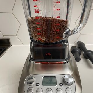 Sage Super Q blender containing nuts and seeds
