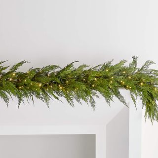 A faux pine garland with lights