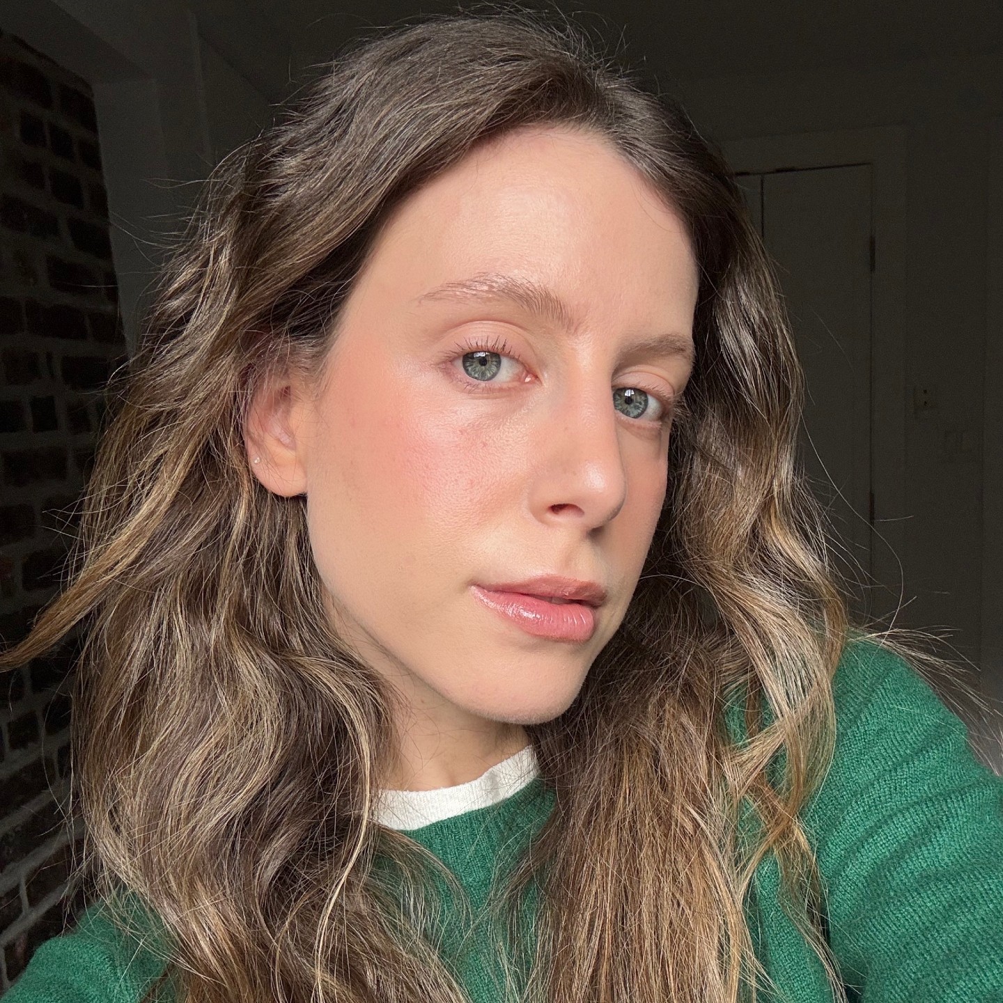 Photo of Jamie Schneider with glowing skin