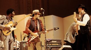 (from left) Albert Collins, Lonnie Mack and Roy Buchanan perform onstage at Carnegie Hall in New York City on December 6, 1985
