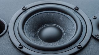 A close up of a computer speaker