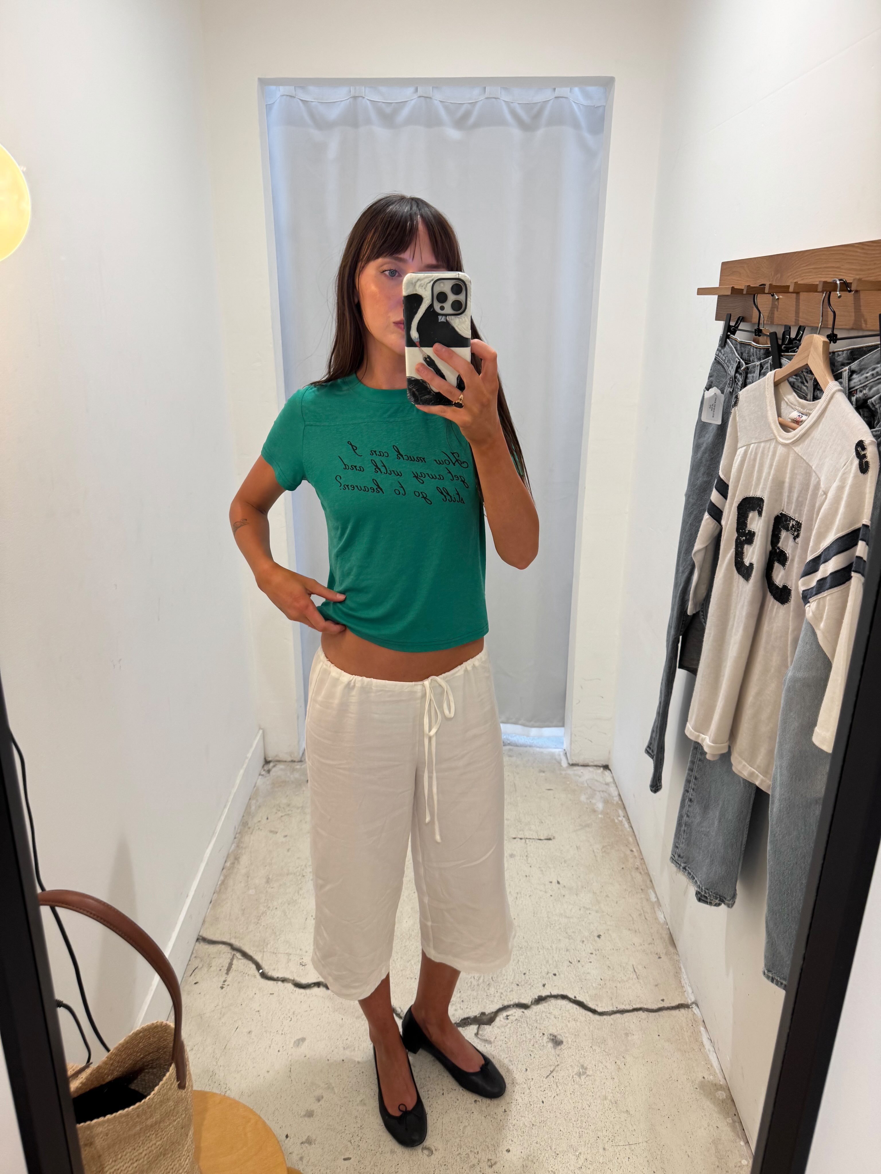 An image of a woman wearing non jeans fall outfit idea 2026