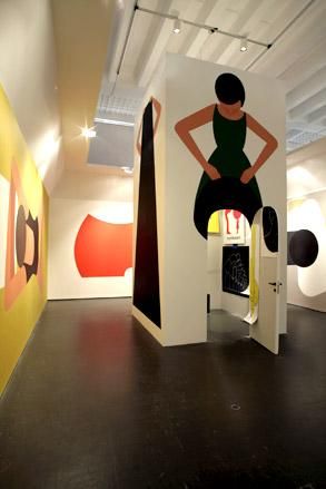 hand-painted tower forms part of an installation by Geoff McFetridge