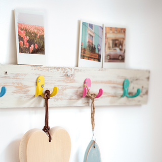 wooden peg rail with hooks