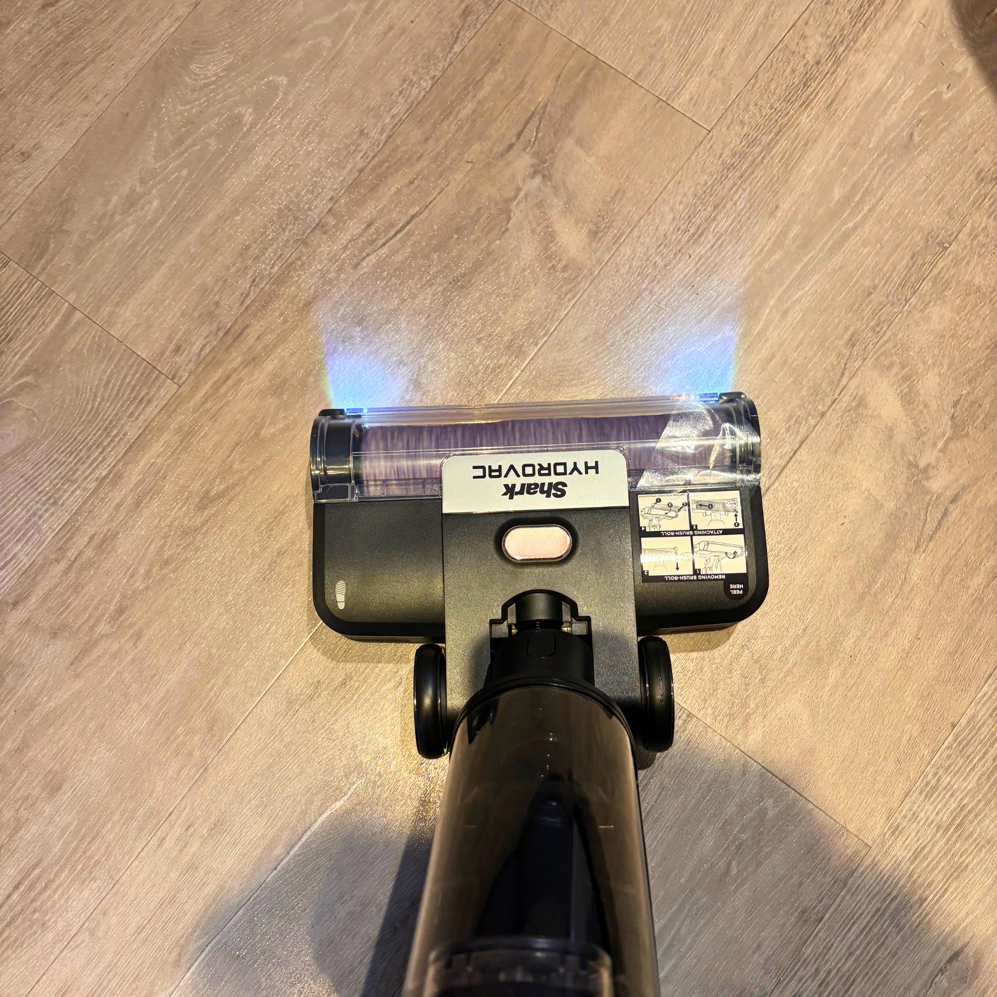 Shark HydroVac Cordless Hard Floor Cleaner in use on laminate flooring
