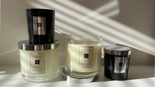 A picture of a few of the best Jo Malone candles against a neutral background