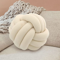 14. Super Soft Knot Ball Pillow: View at Amazon