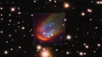 Image showing a multicolored bow shock surrounding a distant star