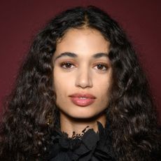 A model wearing a rosy lip color.