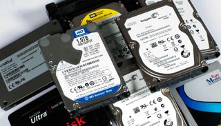 New Momentus XT 750 GB: Benchmarked against popular HDDs and SSDs.