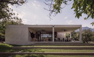 pink render and open terraces at Casa El Aguacate