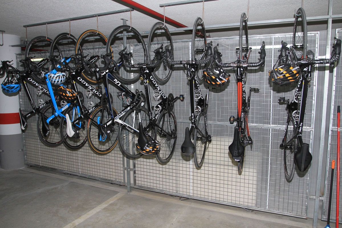 A selection of Wiggle Honda bikes hanging up on the wall ready to be riddden