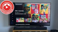 A TV with a BBC iPlayer menu on screen showing the USA vs Australia World Cup match. A logo with a mountain reads "Adventures in AV".