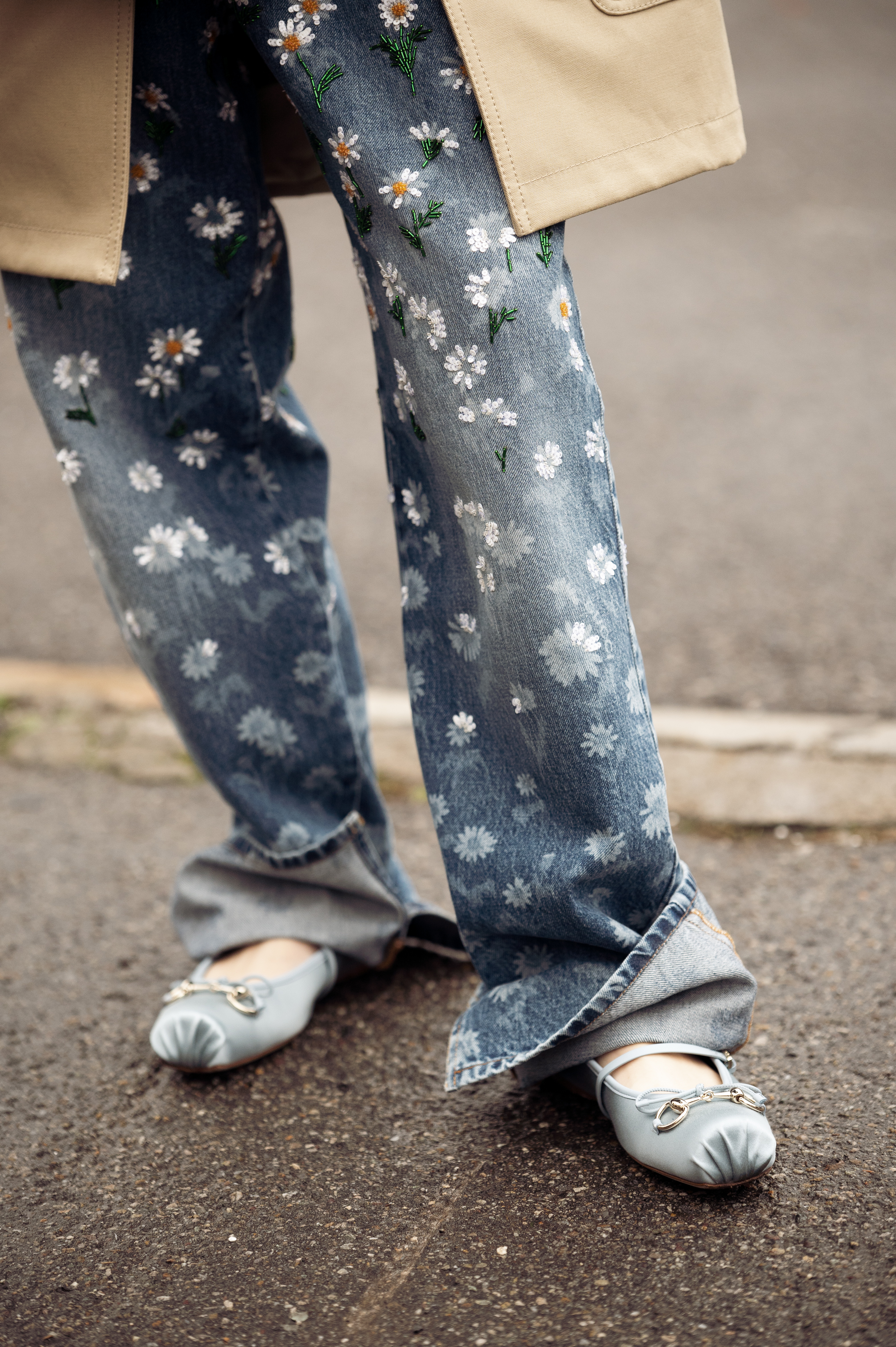 MILAN, ITALY - FEBRUARY 25: Jenny Tsang wears blue jeans with embroidered flowers and blue ballerina flats outside the Gucci fashion show during the Milan Fashion Week Womenswear Fall/Winter 2025/2026 on February 25, 2025 in Milan, Italy. (Photo by Raimonda Kulikauskiene/Getty Images)