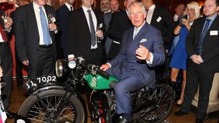 King Charles most memorable moments - 500th Anniversary of the Royal Mail service, Prince Charles poses on vintage motorbike