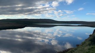 Clouds reflected in Loch Thom