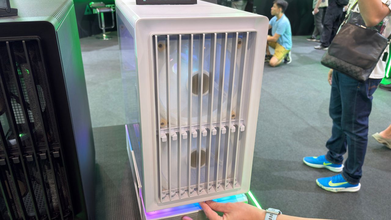 A photo of a Montech F738 Pro PC case, as displayed at Computex 2026, with its front panel shutters fully open