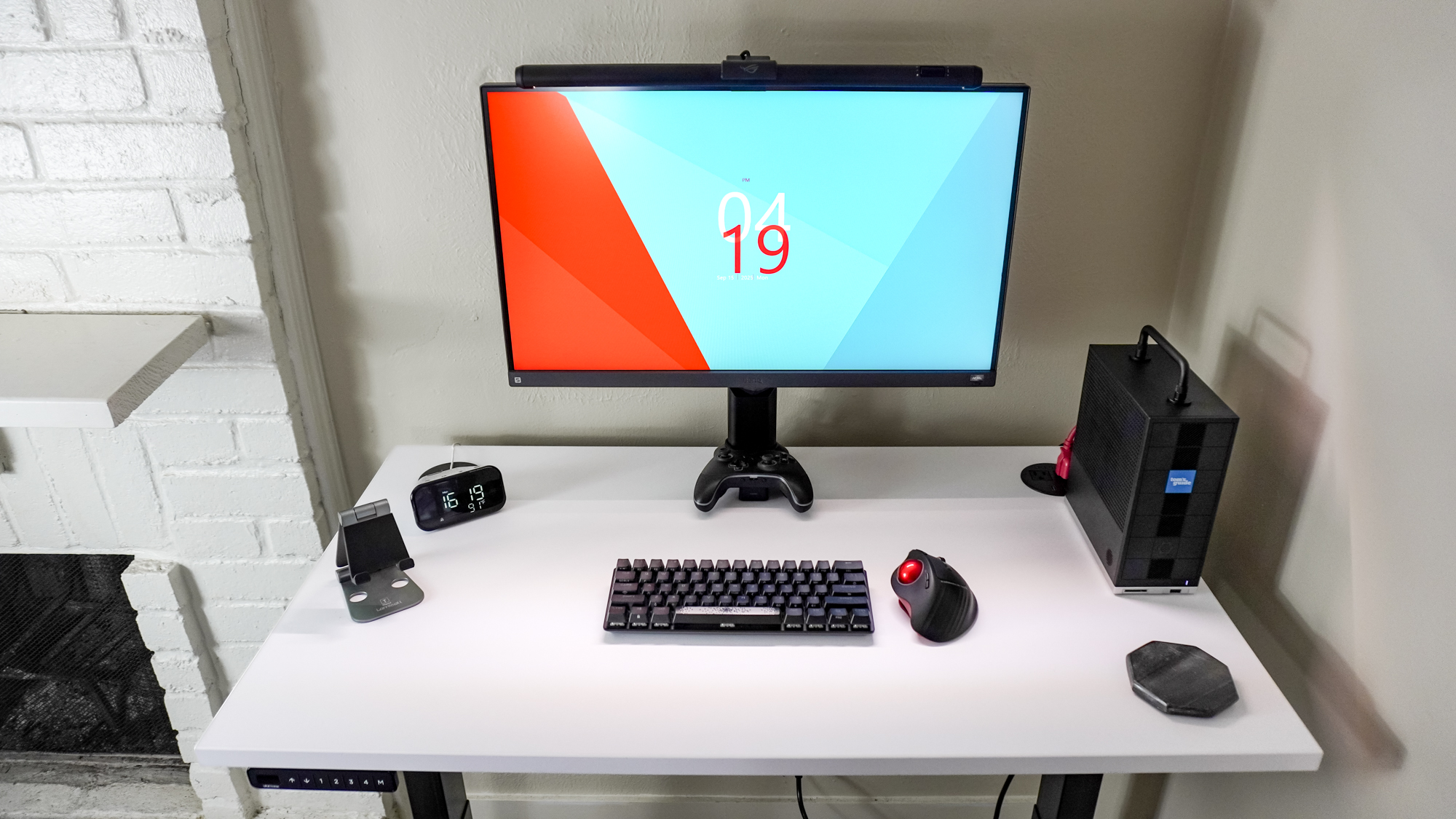 An overhead view of a desk setup built around the Uplift V3 standing desk