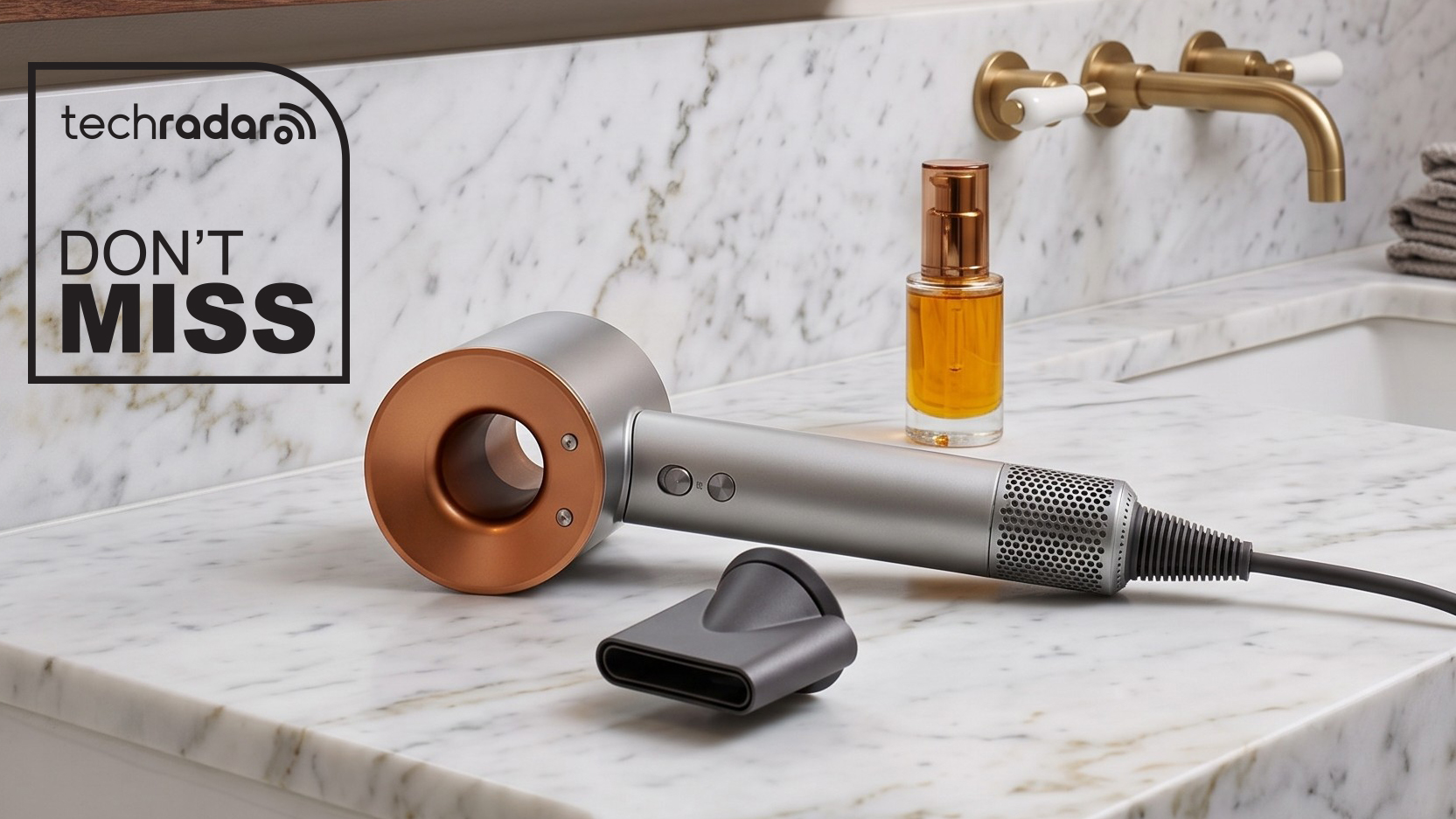 Dyson Supersonic Origin hair dryer laying flat on a marble vanity unit.