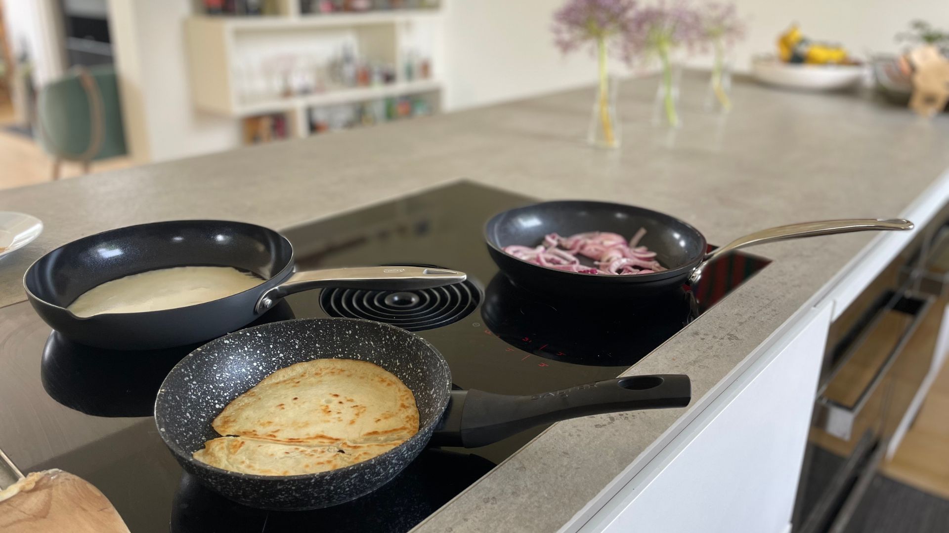 Salter Megastone Frying Pan Set cooking on the hob