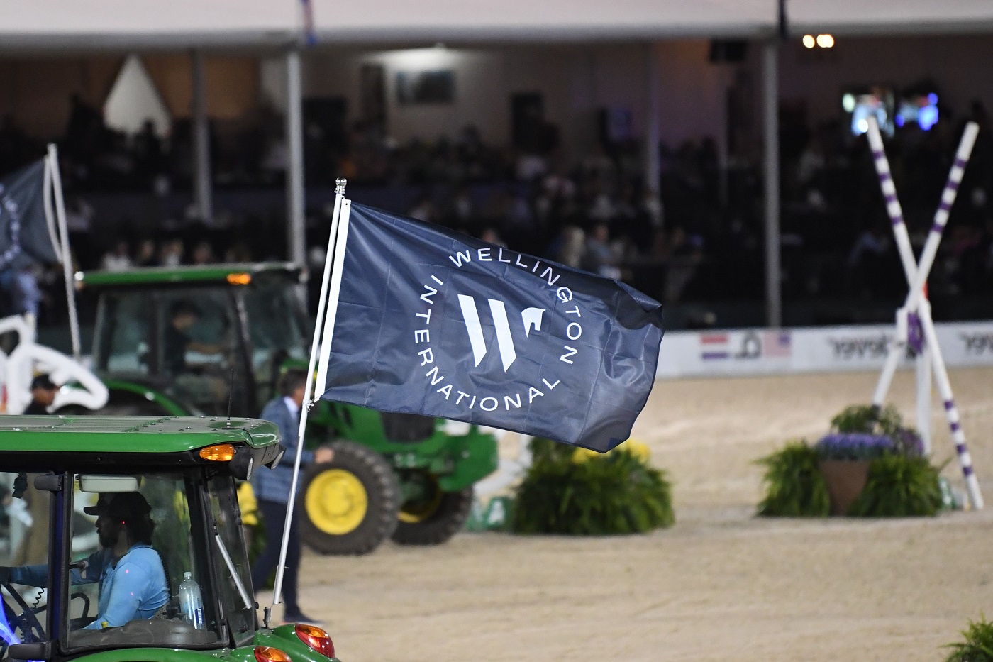 Wellington Internationl flag flies from tractor during drag break