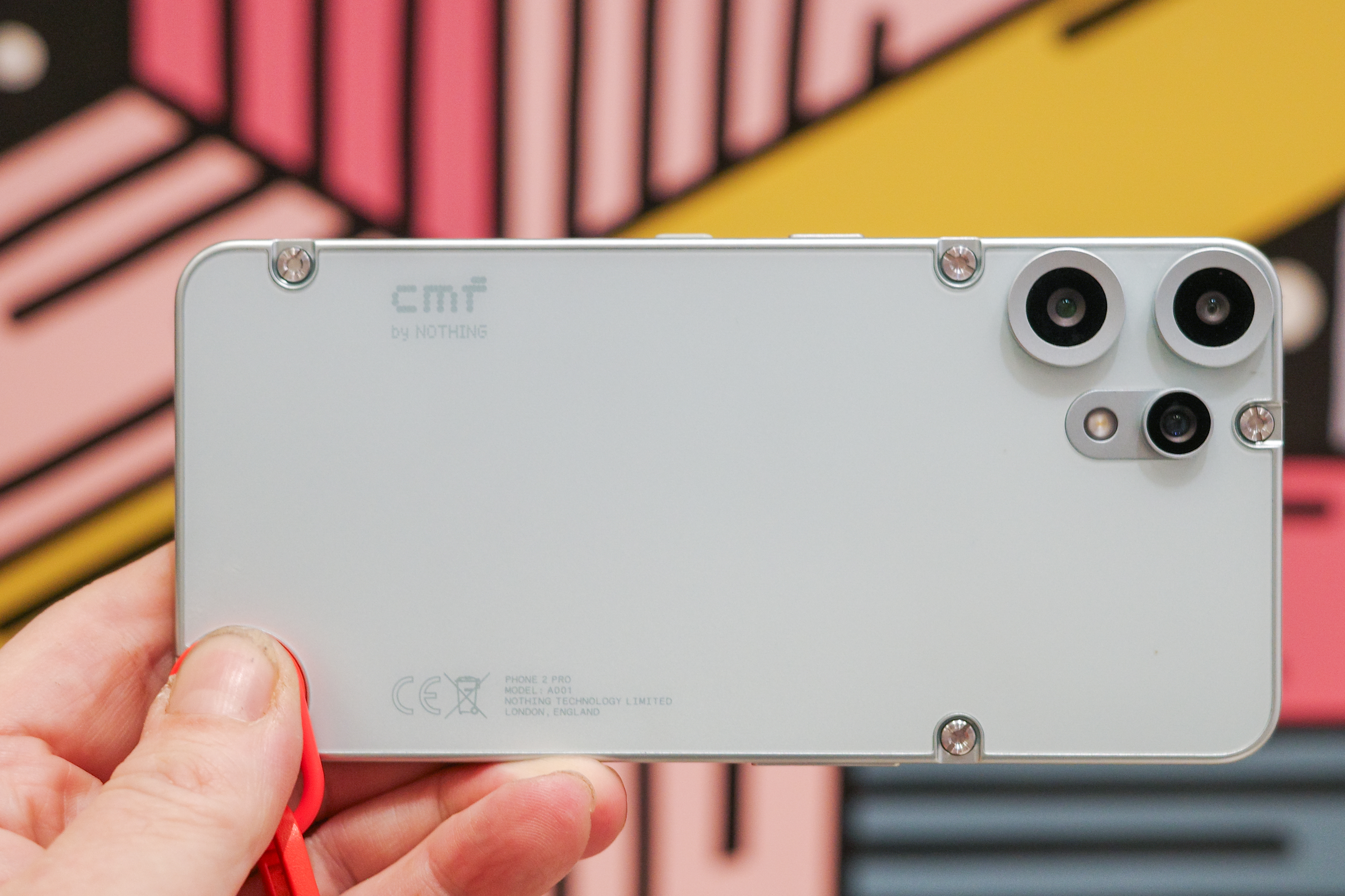 CMF Phone 2 Pro in light green showing back with exposed screws and cameras