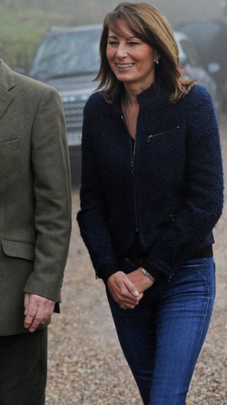 Carole Middleton walks with Michael Middleton outside their Berkshire home