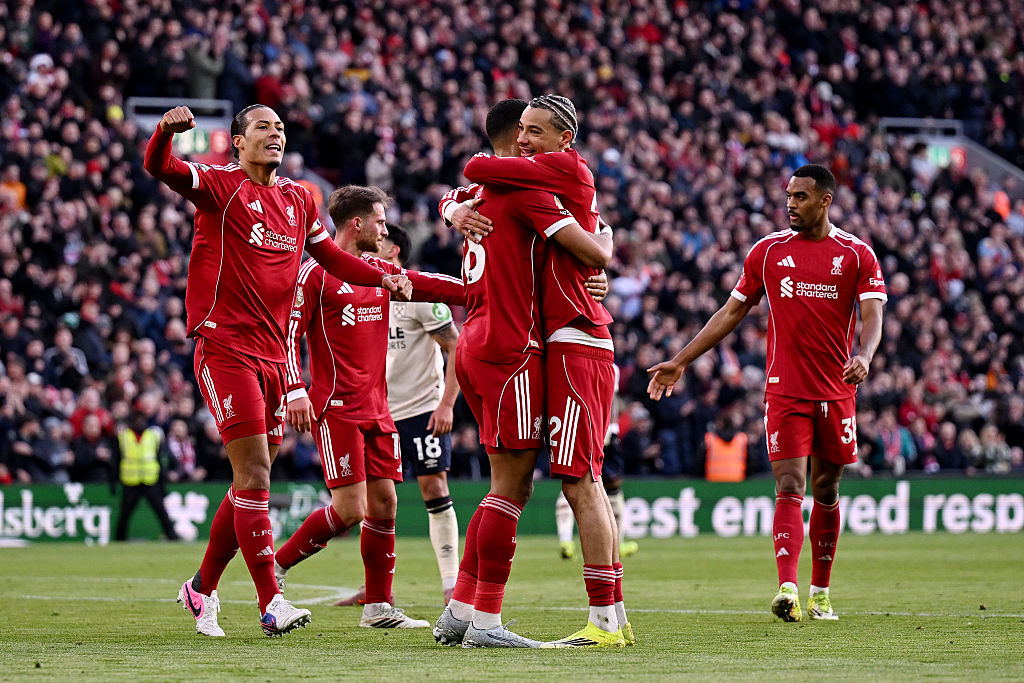 Cody Gakpo of Liverpool celebrates scoring his team's fourth goal with teammates Virgil van Dijk and Hugo Ekitike during the Premier League match between Liverpool and West Ham United at Anfield on February 28, 2026 in Liverpool, England.
