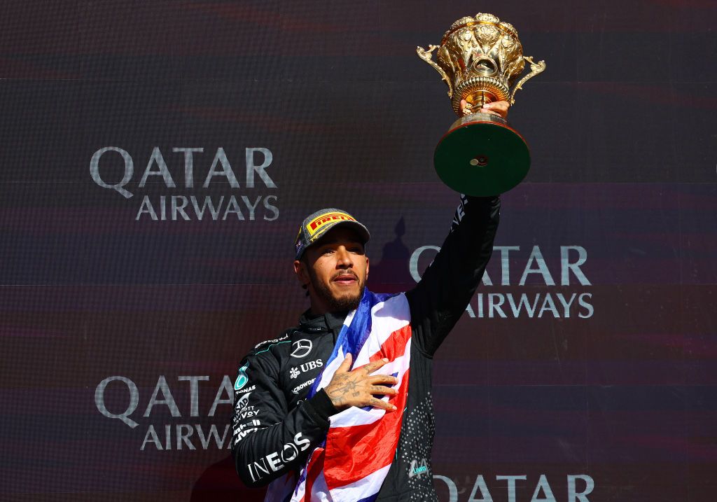 Lewis Hamilton celebrates on the podium during the F1 Grand Prix of Great Britain