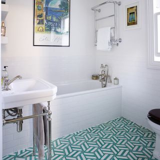 bathroom with white tiles and basin