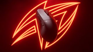 Pulsar TenZ Signature gaming mouse on an illuminated orange brand logo