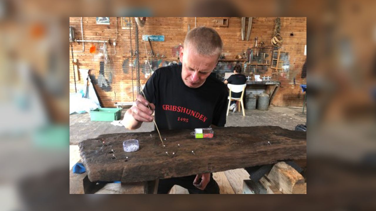 Artifacts recovered from the Gribshunden wreck are being restored and researched by archaeologists on dry land.