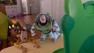 Woody and Buzz Lightyear looking terrified while looking at Lilypad tablet in Bonnie's Room in Disney and Pixar's TOY STORY 5.