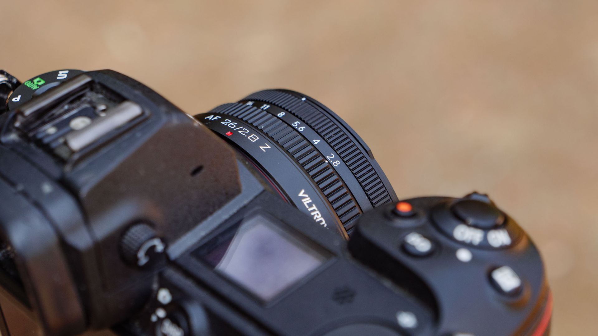 Closeup of the Viltrox AF 26mm F2.8 EVO 'pancake' lens's aperture ring, set to f2.8