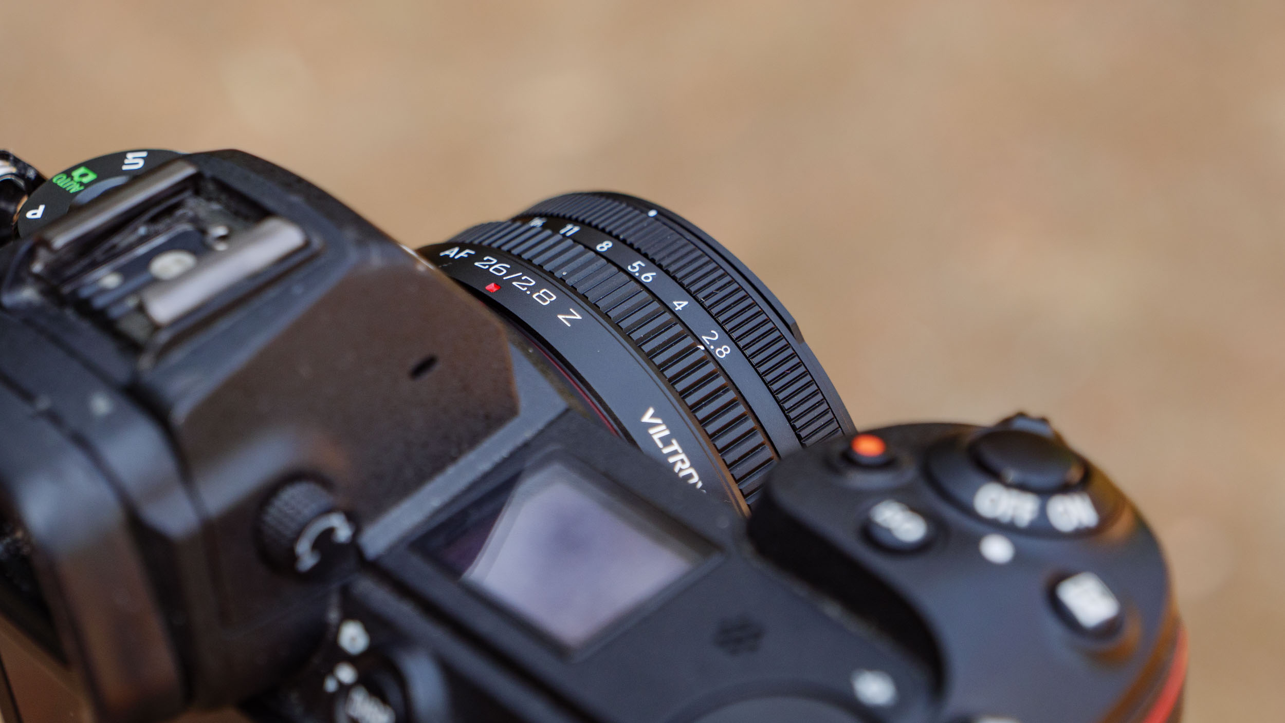 Closeup of the Viltrox AF 26mm F2.8 EVO 'pancake' lens's aperture ring, set to f2.8