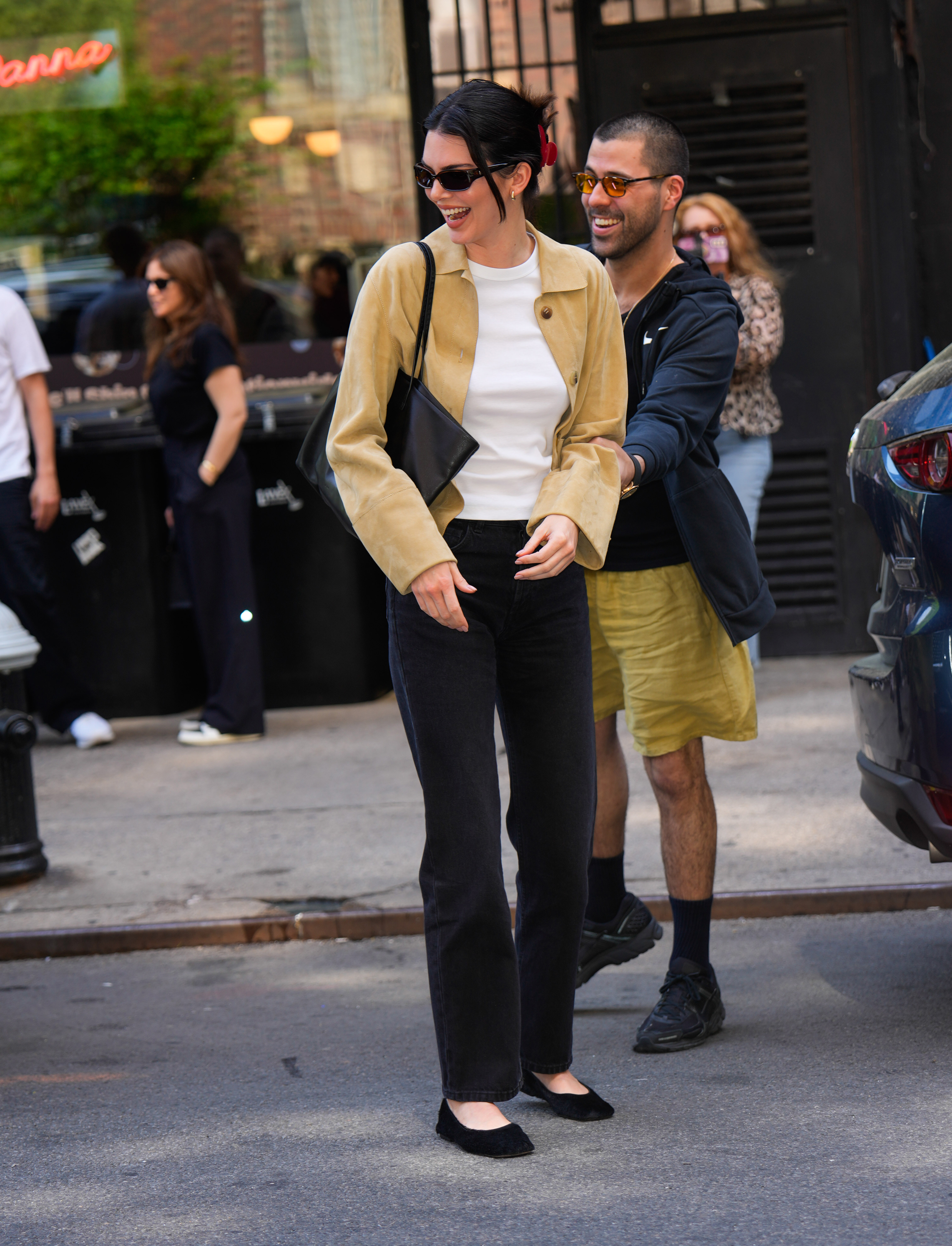 Kendall Jenner wears pony hair ballet flats.