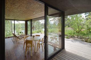 Summerhouse T interior and wooden terrace