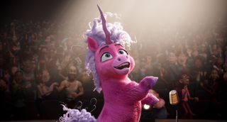 Thelma the Unicorn: a pink unicorn on a stage looking happy