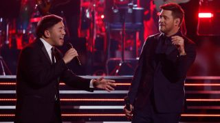 Sofronio Vasquez and Michael Buble perform together on The Voice Season 26 finale.