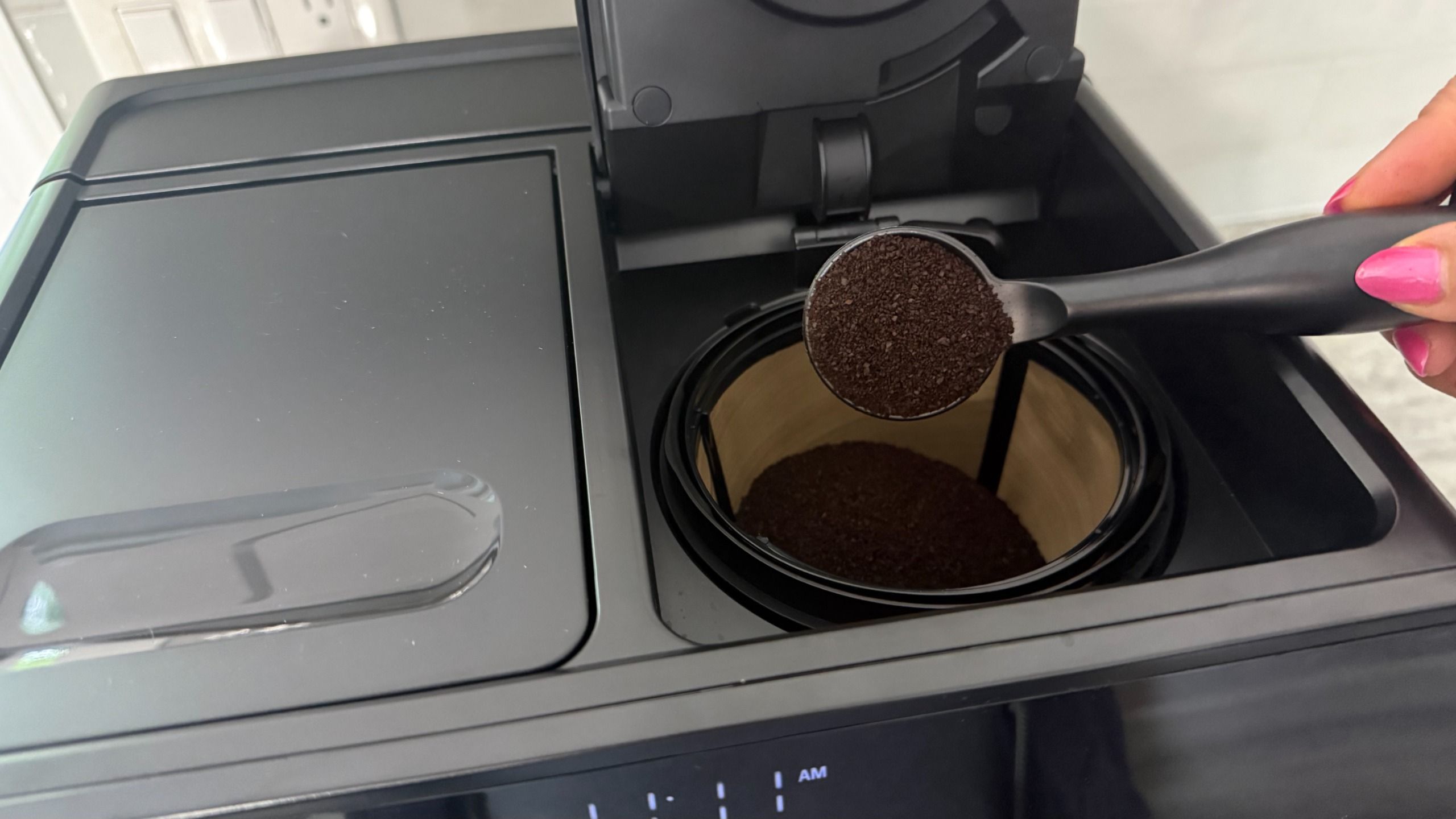 Chefman Coffee Station Pro brewing carafe of drip coffee
