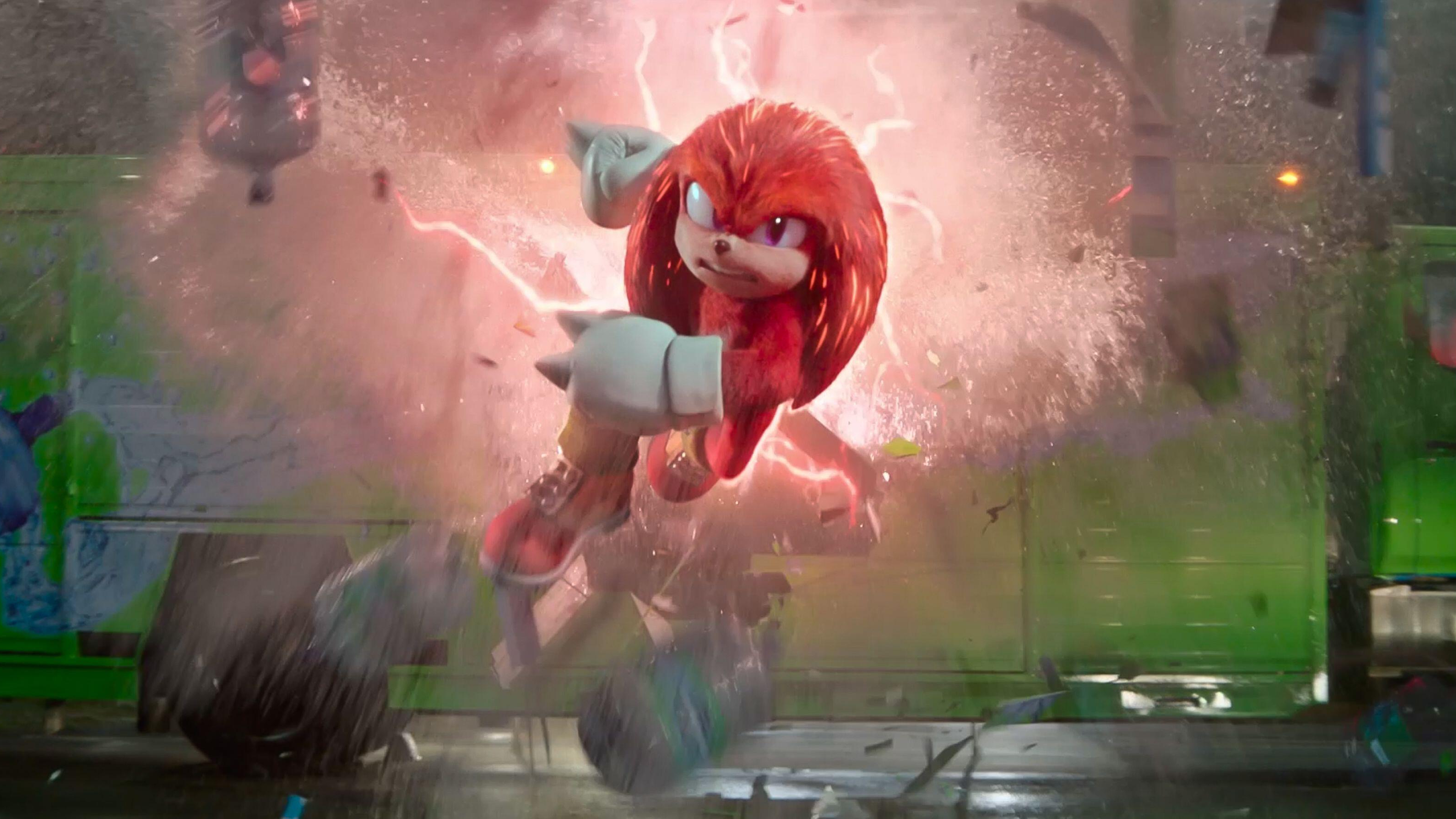 Knuckles the Echidna (Idris Elba) punches through a truck in a scene from "Sonic 2"