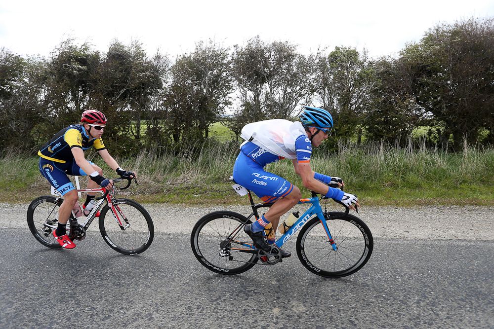 Taylor Gunman (R) of Auckland and Brad Evans of Dunedin out front of the chasing group as they make their way towards Gore during stage five of the Tour of Southland