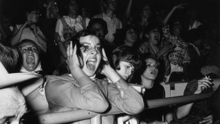 Some Beatles fans screaming in 1964