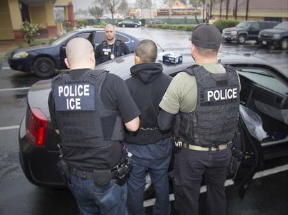 ICE officers make an arrest